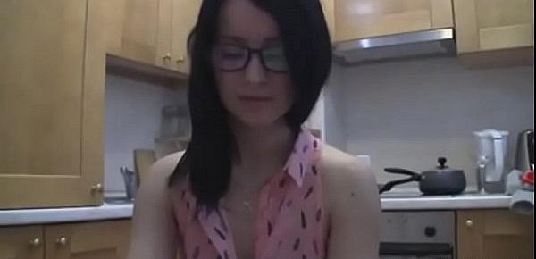  splendid teen with glasses chatting in the kitchen